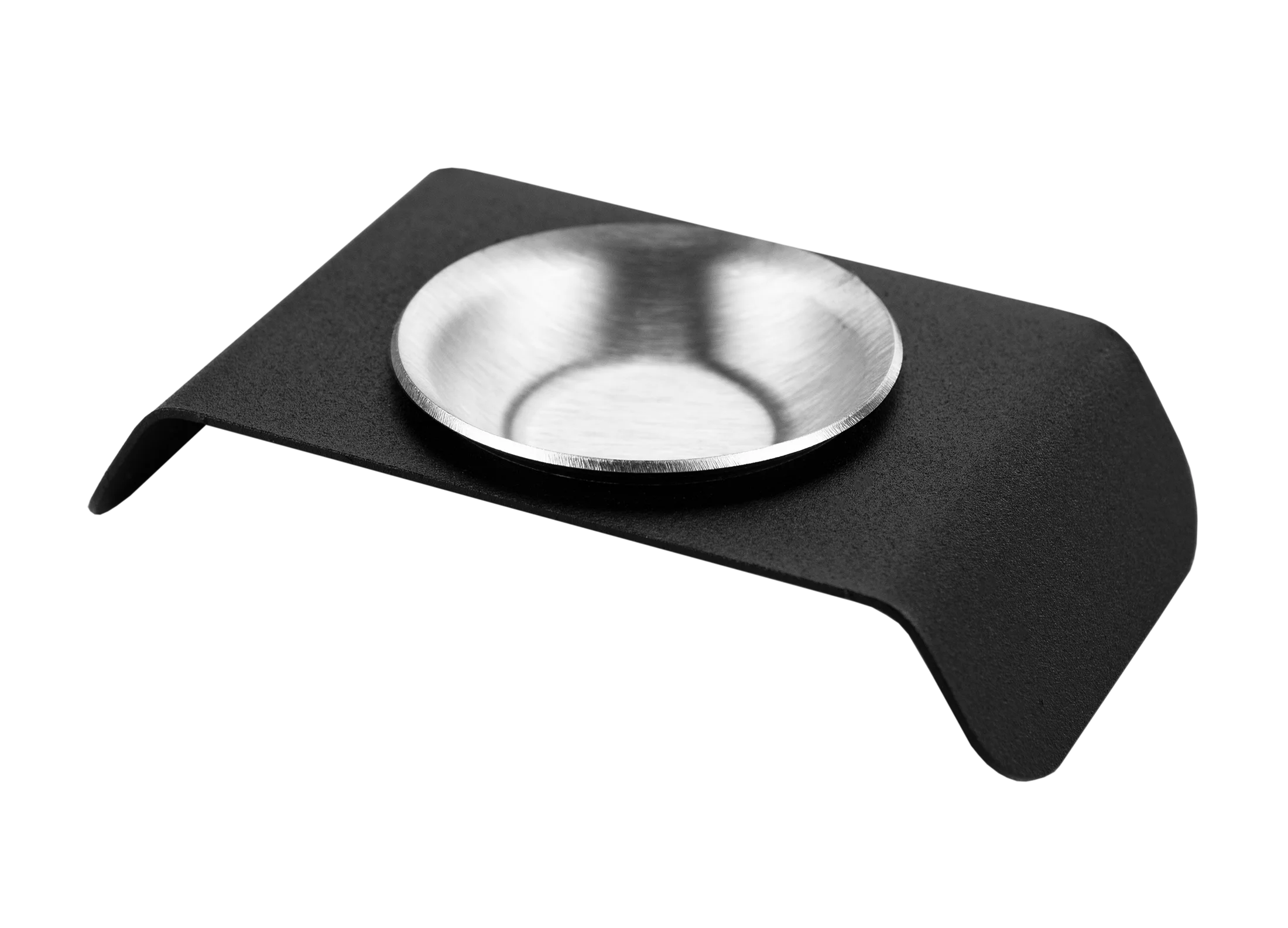 aromaterapiholder i form af en rustfri lille skål på en sort bukket plade